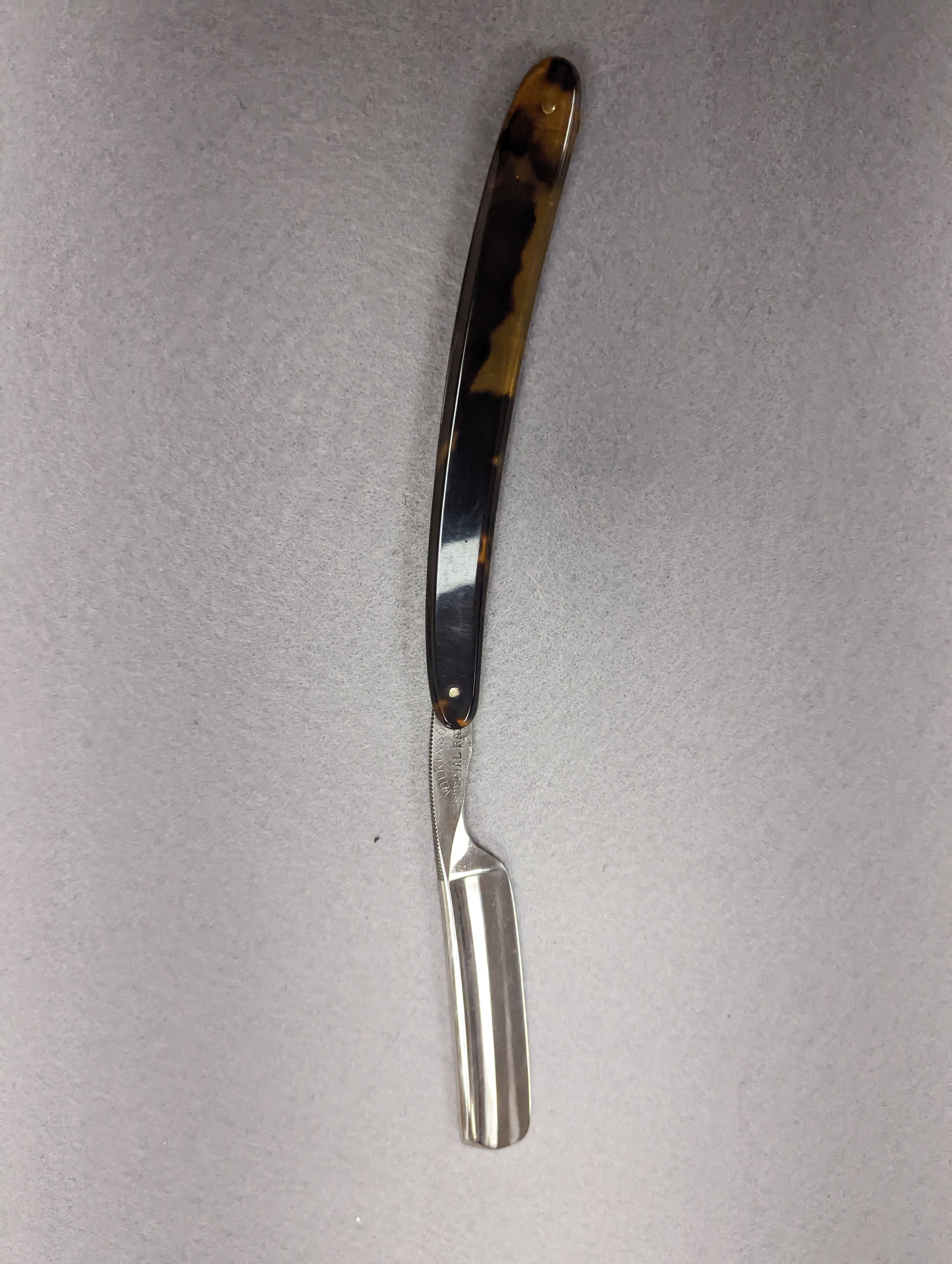 A set of seven tortoiseshell handled cut throat razors for the days of the week Wilkinson and a cased pair of tortoiseshell handled razors, C&W Higginbottom